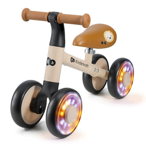 Triciclo correpasillos Kinderkraft CUTIE FLASH beige con ruedas con rodamiento ABEC-7 y luces LED RGB, sillín acolchado ajustable. Andador con estructura de acero estable. Vista principal.