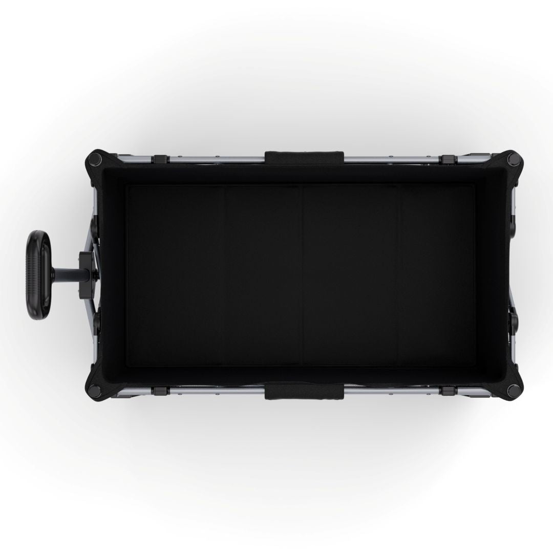 Interior del carrito plegable Kinderkraft ROLLSTER visto desde arriba, capacidad de 130 litros con suelo rígido y bolsillos de malla laterales