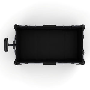 Interior del carrito plegable Kinderkraft ROLLSTER visto desde arriba, capacidad de 130 litros con suelo rígido y bolsillos de malla laterales