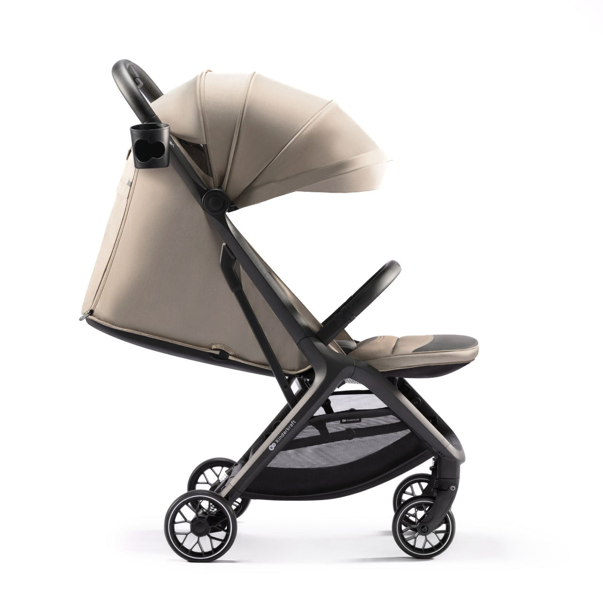 Coche de paseo Kinderkraft NUBI 2 beige con respaldo reclinado a posición tumbada, apto para recién nacido, vista lateral