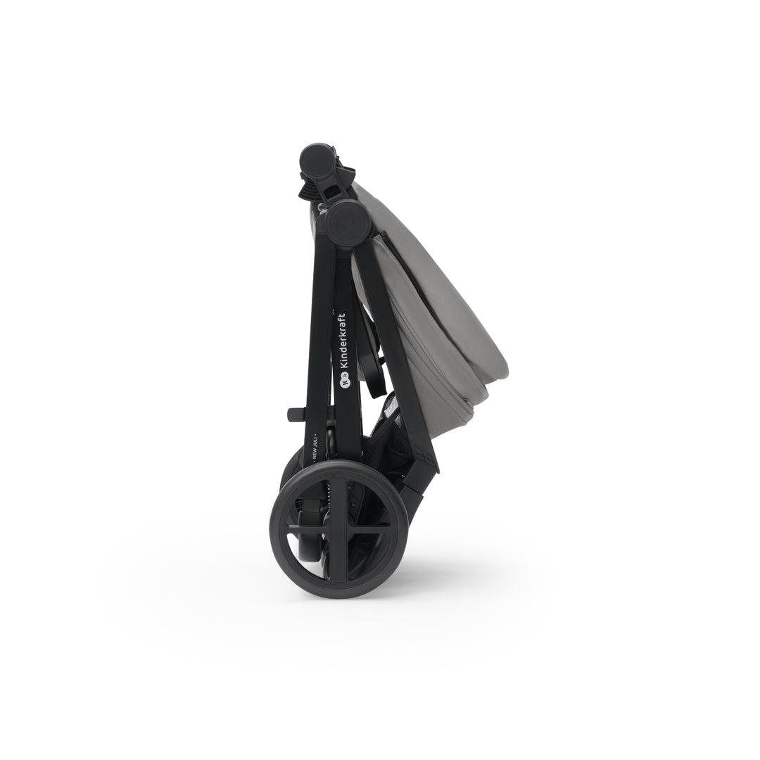 Coche TravelSystem Kinderkraft NEWLY 3 en 1 gris plegado de forma compacta, vista lateral
